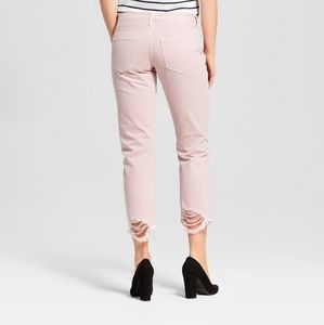 Low rise distressed boyfriend jeans in soft pink